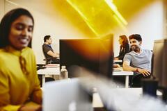 Men and women working in an office