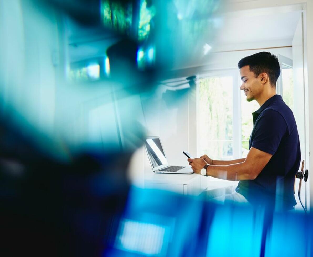 man looking at a computer