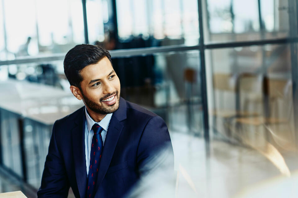 Profile view of a man in a suit 