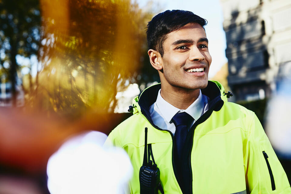 A man in a reflective jacket